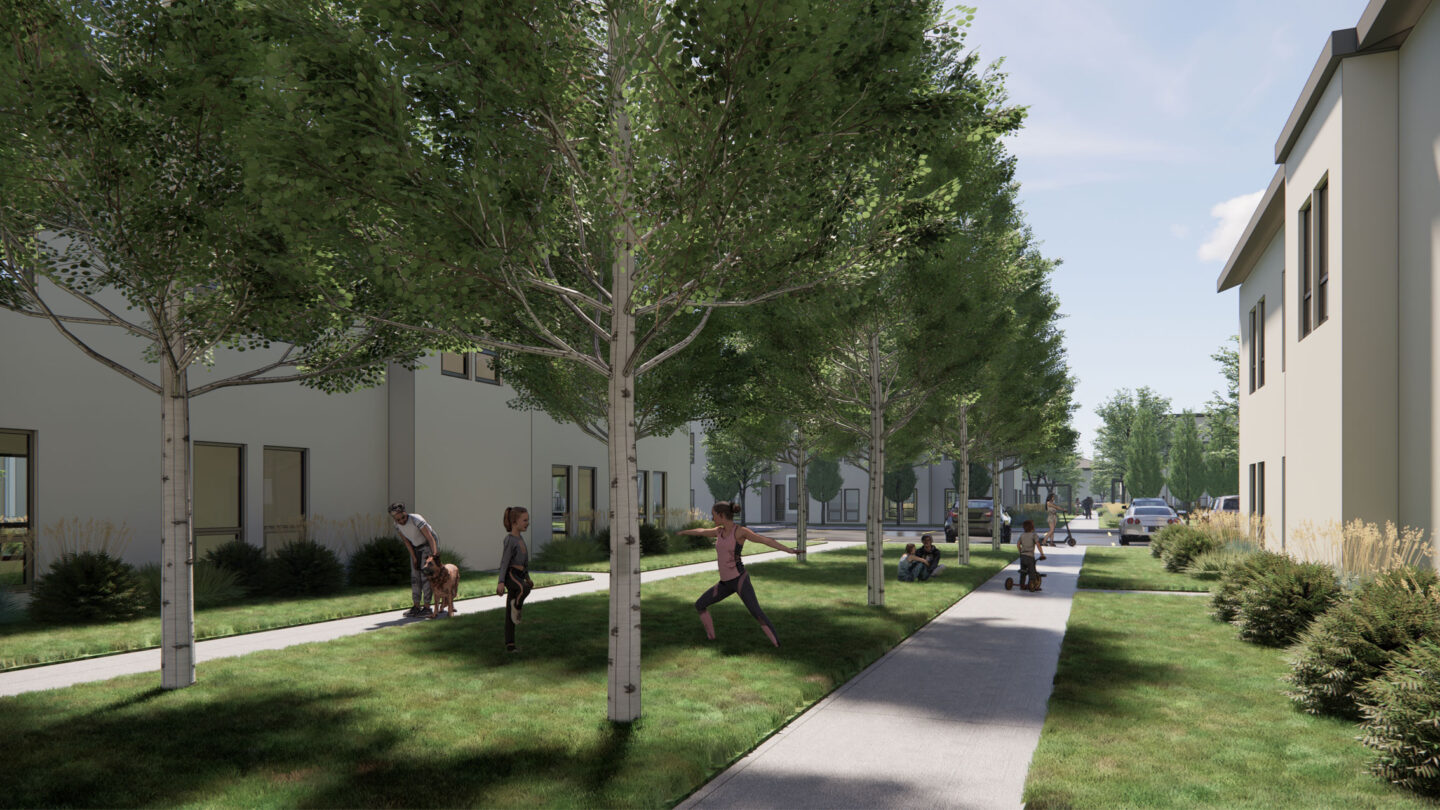 Walkways and green space between buildings with trees and people exercising. parking lot with cars is in the background